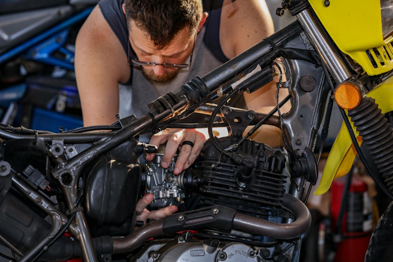 Technician working on a motorcycle